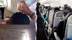 Passenger's bizarre use of drinking glass on flight leaves travelers horrified Adelaide Accountant